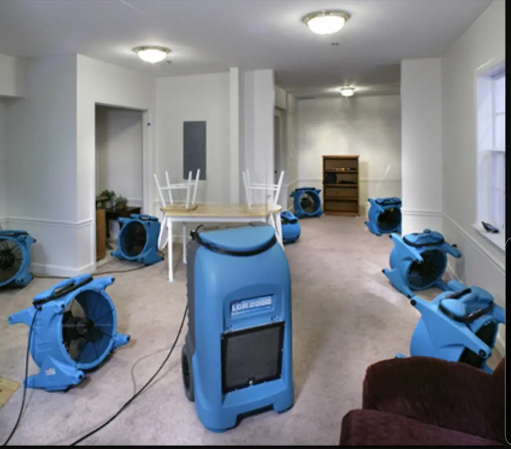 Air movers and dehumidifier setup for Water Damage Restoration in Semmes